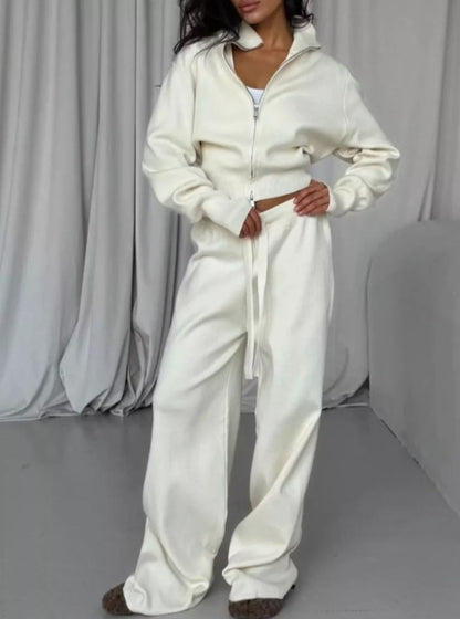 ALBA | Pantalon large, veste zippée.